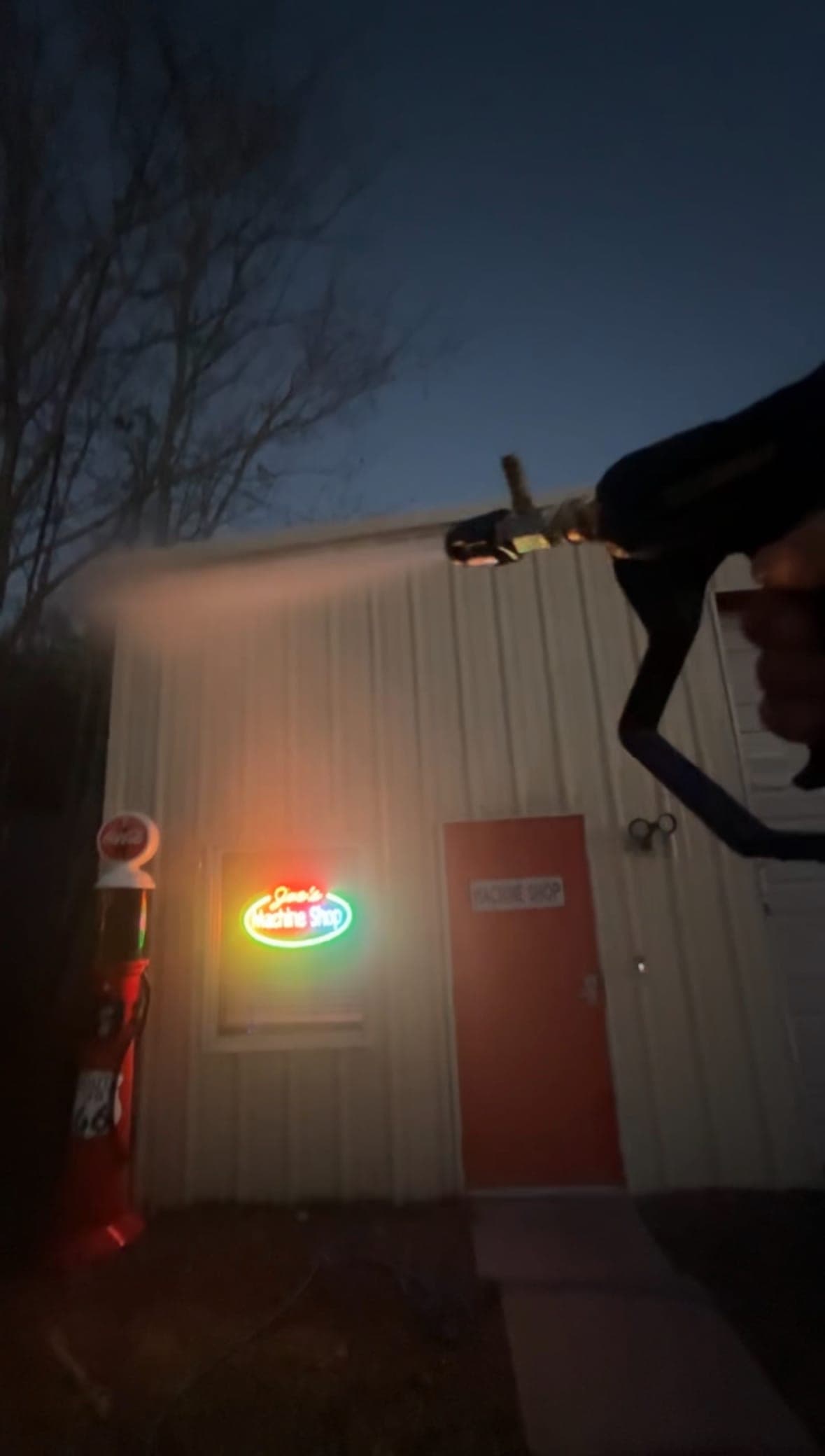 Commercial building pressure washing at night in Irmo, SC